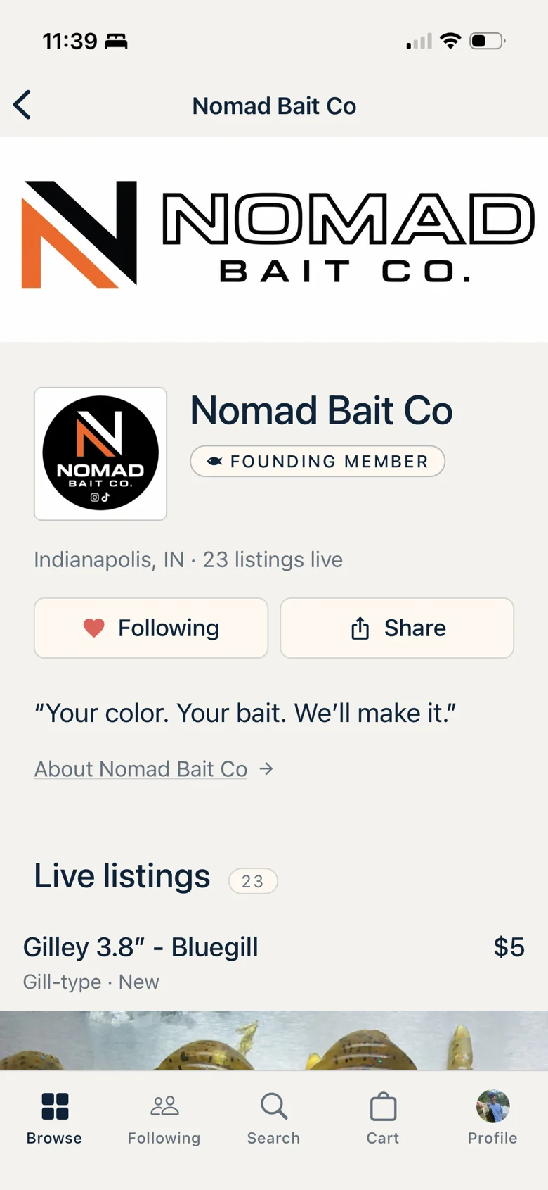 The Nomad Bait Co storefront on iPhone: shop banner, founding member badge, Indianapolis, Indiana, and twenty three listings live.